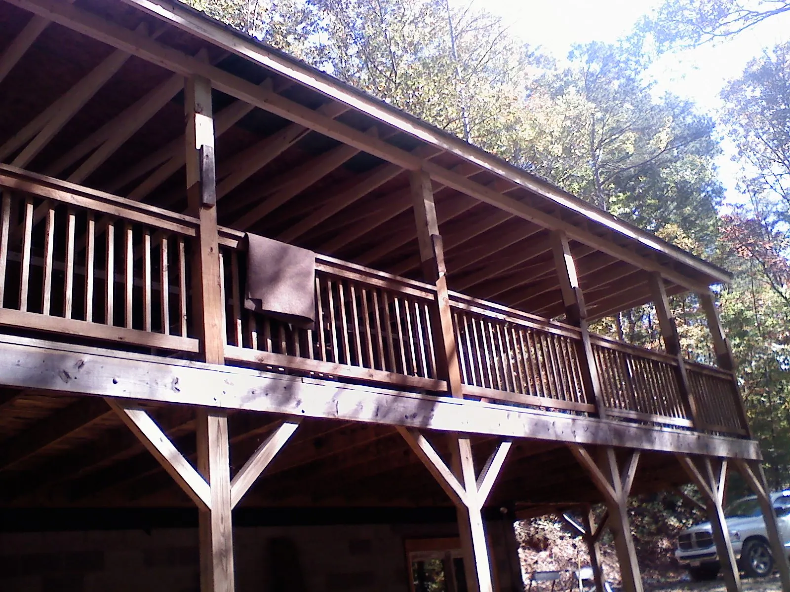 Timber framing under a new elevated porch and deck — Roof Leak Repair in Pinckneyville by Roofing Brothers